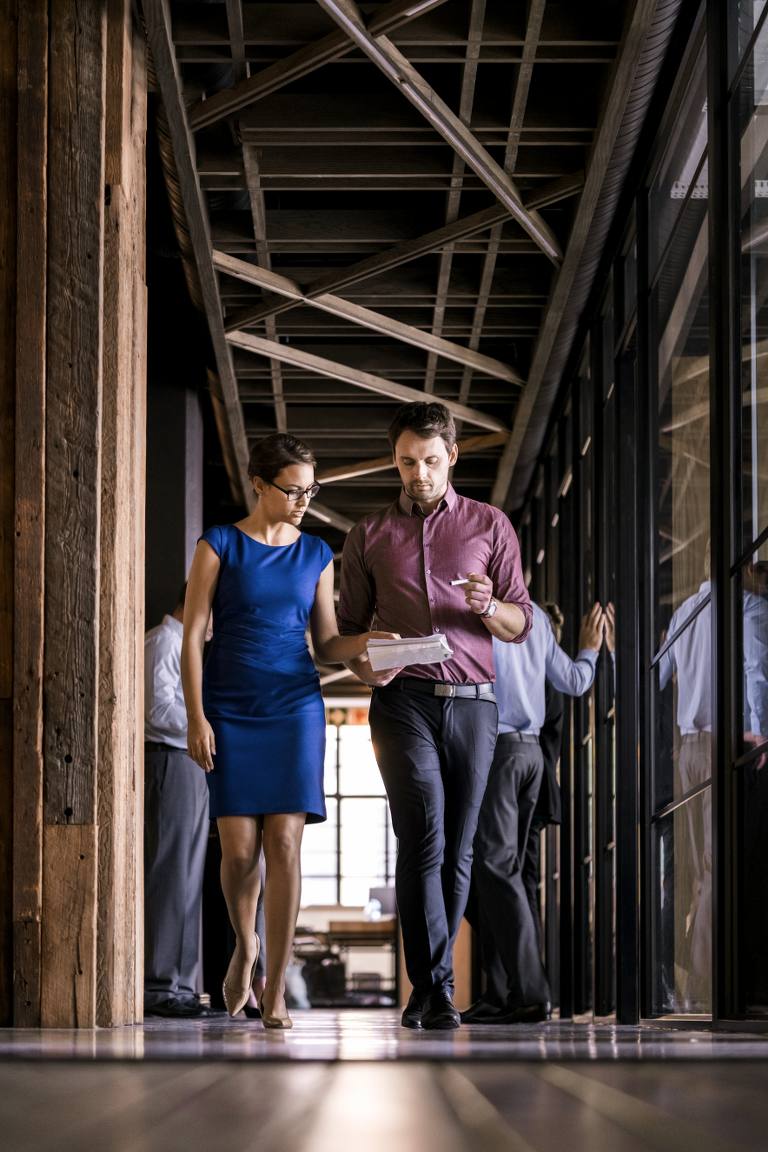 istock_90265465_woman_walking_at_construction_site_with_counselor_9-27-16_768x1152